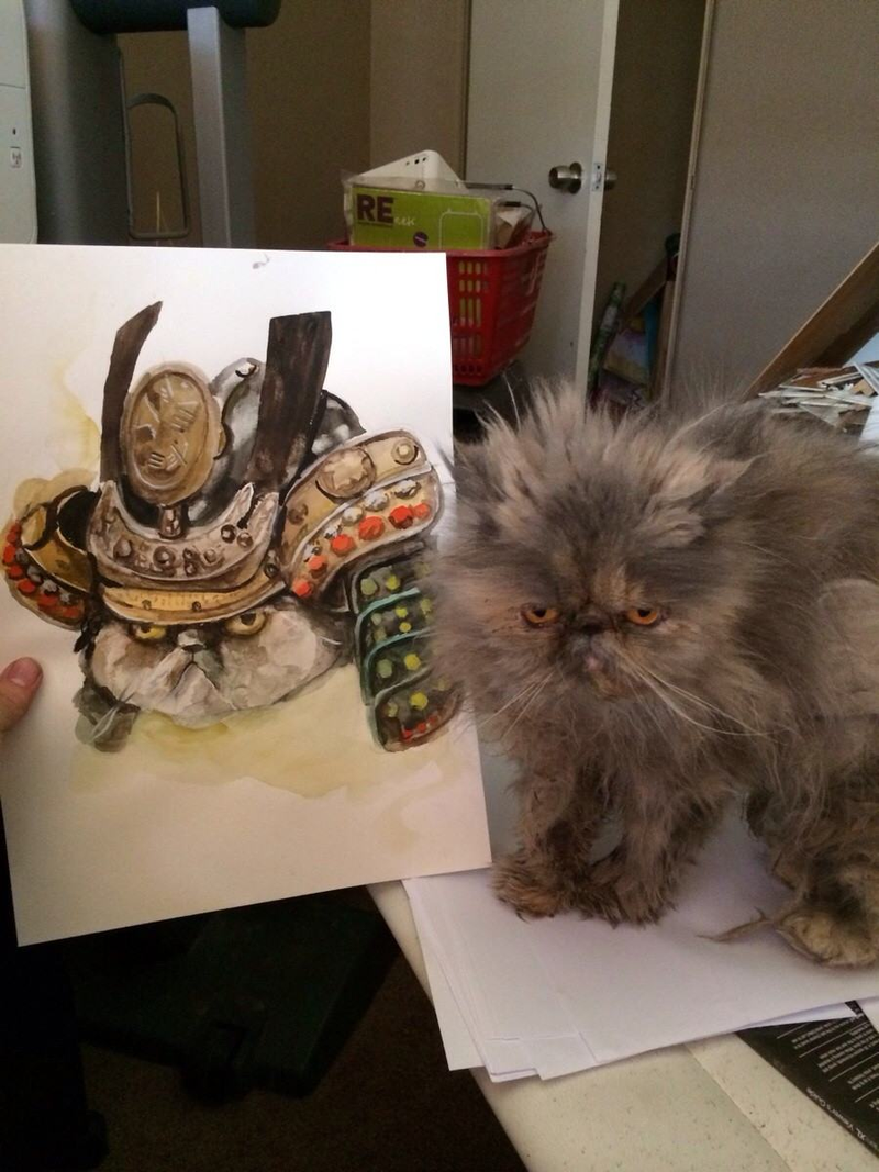 Illustration for article titled Animals posing with their portraits
